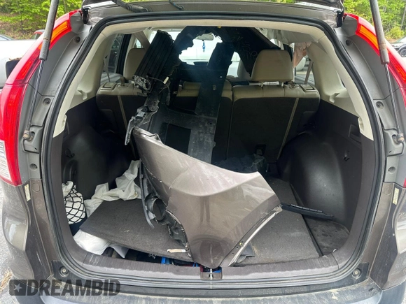 2013 Honda CR-V EX-L z VIN 5J6RM4H71DL020602, wystawiony jako Copart lot #58172105 z przebiegiem 199 775 mil mil oraz Tytuł czysty. Historia ofert i sprzedaży dostępna na DreamBid. Obrazek 9.