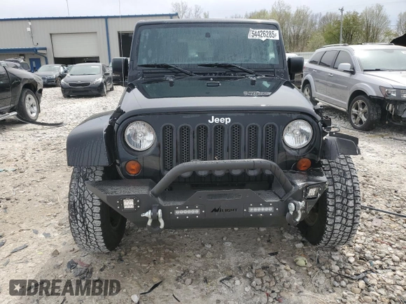 2011 Jeep Wrangler Sahara с VIN 1J4AA5D19BL543294, выставлен на аукционе Copart как лот 54426285 с пробегом 151 912 миль миль и Чистый • Clean title. История ставок и продаж доступна на DreamBid. Изображение 5.