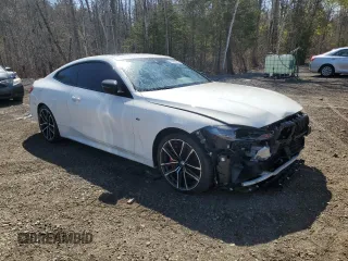 2021 BMW 4 Series M440i xDrive with VIN WBA13AR00MCG86985, listed as a Copart auction lot 49809835 with 112,112 mi miles and Clean Title. Bid and sale history available at carsss.com. Image 4.