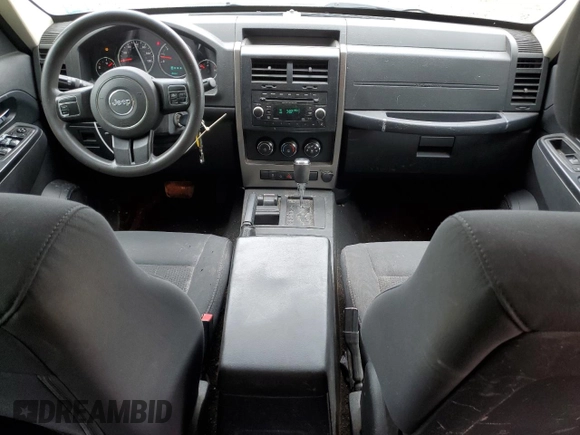 2012 Jeep Liberty Sport with VIN 1C4PJMAK9CW212920, listed as a Copart auction lot 61192785 with 181,561 mi miles and Salvage title. Bid and sale history available at DreamBid. Image 8.