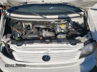 2003 Volkswagen EuroVan MV с VIN WV2MB47053H012029, выставлен на аукционе Copart как лот 68222234 с пробегом 247 494 миль миль и Списание • Salvage title. История ставок и продаж доступна на DreamBid. Изображение 12.