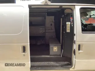 2013 Ford Econoline Cargo Commercial with VIN 1FTNE1EW9DDA61968, listed as a IAAI auction lot 42643038 with 121,719 mi miles and . Bid and sale history available at DreamBid. Image 14.
