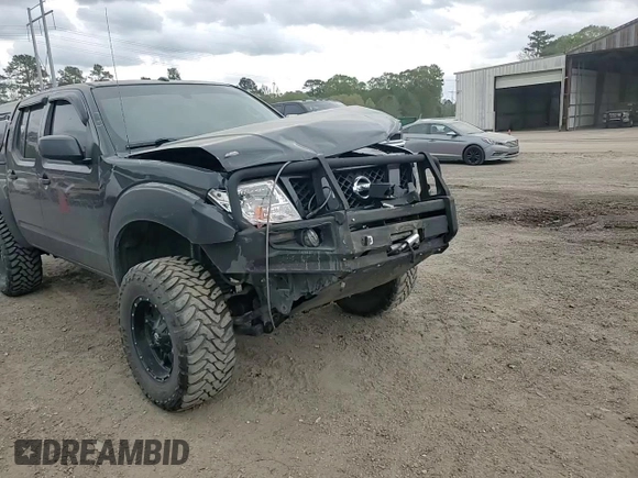 2012 Nissan Frontier Pro-4X with VIN 1N6AD0EVXCC415470, listed as a Copart auction lot 50650915 with 157,160 mi miles and Salvage title. Bid and sale history available at DreamBid. Image 10.