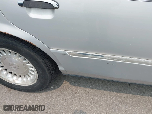 1999 Mercury Grand Marquis LS z VIN 2MEFM75W7XX659031, wystawiony jako IAAI lot #42362387 z przebiegiem 140 067 mil mil oraz . Historia ofert i sprzedaży dostępna na DreamBid. Obrazek 12.