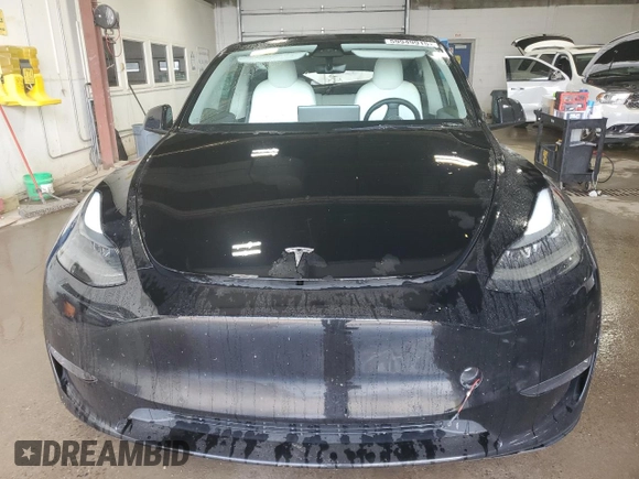 2022 Tesla Model Y Performance z VIN 7SAYGDEF7NF523532, wystawiony jako Copart lot #59949915 z przebiegiem 50 428 mil mil oraz Szkoda całkowita • Salvage title. Historia ofert i sprzedaży dostępna na DreamBid. Obrazek 5.