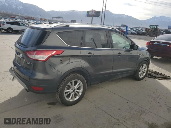 2015 Ford Escape Titanium with VIN 1FMCU9J93FUA28794, listed as a Copart auction lot 50655305 with 112,105 mi miles and Salvage title. Bid and sale history available at DreamBid. Image 3.