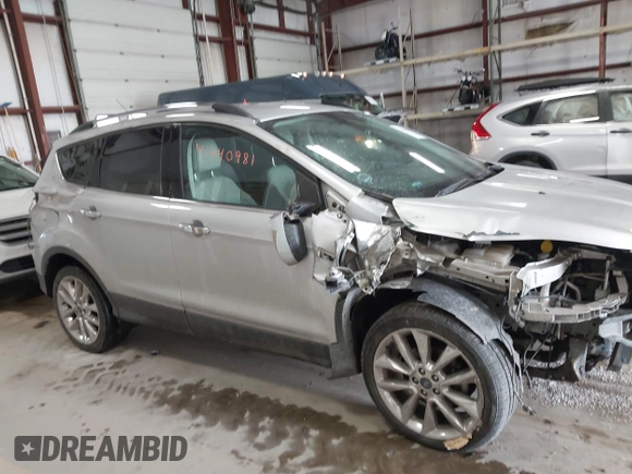 2016 Ford Escape SE with VIN 1FMCU0GX6GUB91605, listed as a IAAI auction lot 41640981 with 130,517 mi miles. Bid and sale history available at carsss.com. Image 14.