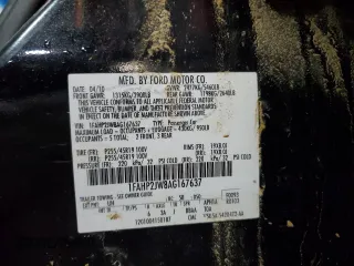 2010 Ford Taurus Limited z VIN 1FAHP2JW8AG167637, wystawiony jako Copart lot #75367344 z przebiegiem 177 346 mil mil oraz Szkoda całkowita • Salvage title. Historia ofert i sprzedaży dostępna na DreamBid. Obrazek 13.