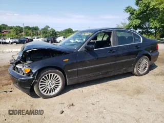 2003 BMW 3 Series 330xi with VIN WBAEW53413PG21999, listed as a Copart auction lot 60724374 with 137,242 mi miles and Salvage Title. Bid and sale history available at carsss.com. Image 1.