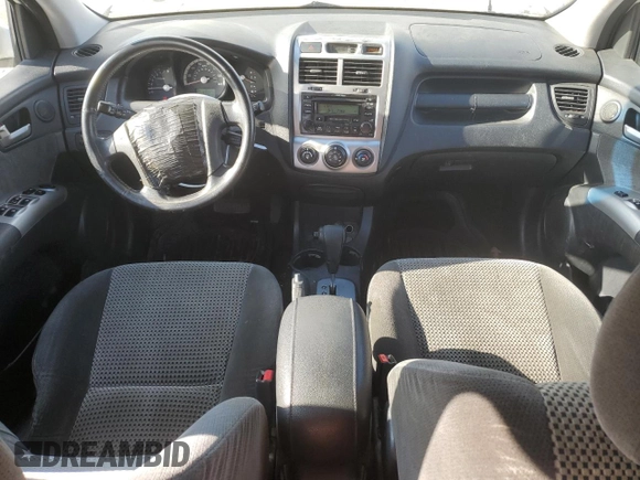 2006 Kia Sportage LX with VIN KNDJF723467205078, listed as a Copart auction lot 86888074 with 231,886 mi miles and Salvage Title. Bid and sale history available at DreamBid. Image 8.