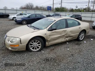 2000 Chrysler 300M M with VIN 2C3HE66G7YH139310, listed as a Copart auction lot 64405754 with 153,432 mi miles and Salvage Title. Bid and sale history available at DreamBid. Image 1.