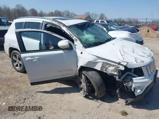 2017 Jeep Compass High Altitude with VIN 1C4NJDEB7HD126672, listed as a IAAI auction lot 42092628 with 90,386 mi miles and . Bid and sale history available at DreamBid. Image 1.