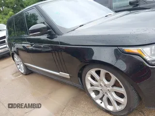 2015 Land Rover Range Rover HSE with VIN SALGS2VF0FA232420, listed as a IAAI auction lot 42482614 with 130,377 mi miles and . Bid and sale history available at DreamBid. Image 13.