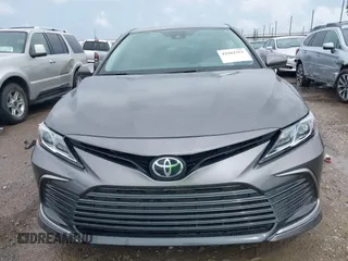 2024 Toyota Camry LE z VIN 4T1C11AK2RU879602, wystawiony jako IAAI lot #42162353 z przebiegiem 6 185 mil mil oraz . Historia ofert i sprzedaży dostępna na DreamBid. Obrazek 11.