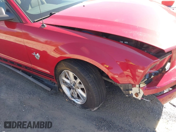 2009 Ford Mustang with VIN 1ZVHT80N695136392, listed as a IAAI auction lot 41509619 with 141,563 mi miles and . Bid and sale history available at carsss.com. Image 19.