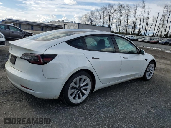 2021 Tesla Model 3 Standard Range Plus with VIN 5YJ3E1EA0MF861546, listed as a Copart auction lot 51014875 with 43,011 mi miles and Salvage Title. Bid and sale history available at DreamBid. Image 3.