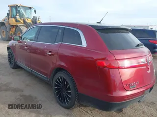2014 Lincoln MKT EcoBoost with VIN 2LMHJ5ATXEBL58430, listed as a IAAI auction lot 41657571 with 58,502 mi miles and . Bid and sale history available at DreamBid. Image 3.