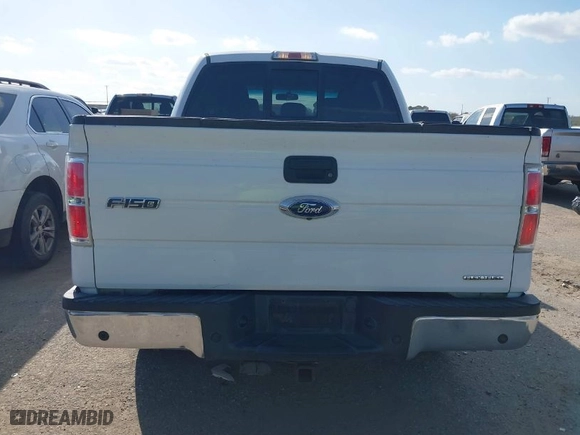 2013 Ford F-150 XL with VIN 1FTFW1CF2DKE62990, listed as a IAAI auction lot 41767912 with 257,503 mi miles. Bid and sale history available at carsss.com. Image 16.