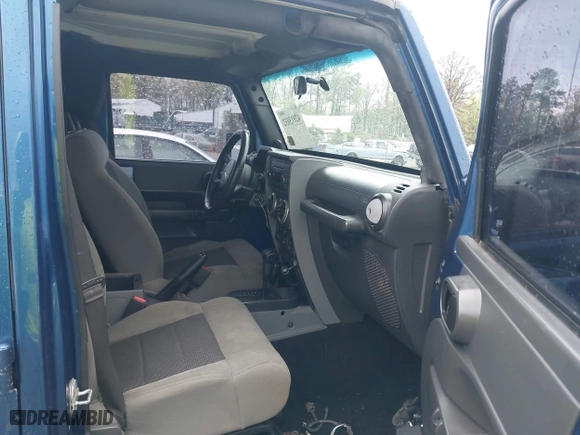 2010 Jeep Wrangler Unlimited Sport with VIN 1J4BA3H11AL144560, listed as a IAAI auction lot 42013032 with 226,233 mi miles. Bid and sale history available at carsss.com. Image 5.