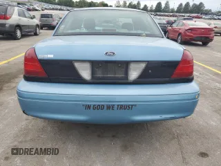 2004 Ford Police Interceptor Base w/3.27 Axle with VIN 2FAFP71W44X176595, listed as a Copart auction lot 72642164 with 136,019 mi miles and Salvage title. Bid and sale history available at DreamBid. Image 6.
