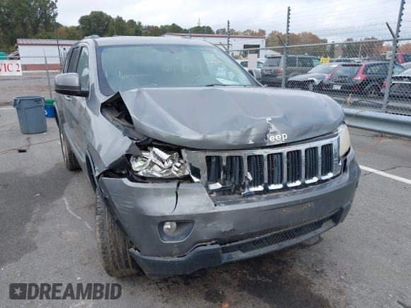 2012 Jeep Grand Cherokee Laredo with VIN 1C4RJFAG8CC298268, listed as a IAAI auction lot 40787833 with 206,486 mi miles. Bid and sale history available at carsss.com. Image 6.