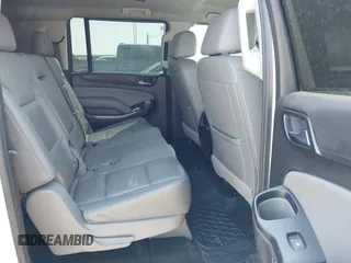2018 Chevrolet Suburban LT with VIN 1GNSKHKC5JR104240, listed as a IAAI auction lot 41892859 with Not Provided miles and . Bid and sale history available at DreamBid. Image 8.