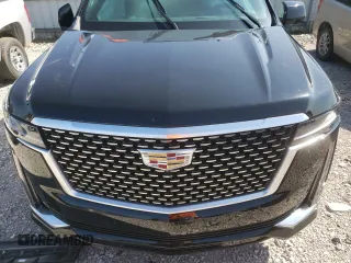 2023 Cadillac Escalade ESV 4WD Premium Luxury z VIN 1GYS4KKL0PR478788, wystawiony jako Copart lot #70177094 z przebiegiem Nie podano mil oraz Szkoda całkowita • Salvage title. Historia ofert i sprzedaży dostępna na DreamBid. Obrazek 12.