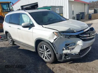 2016 Honda Pilot Elite with VIN 5FNYF6H05GB019292, listed as a IAAI auction lot 41668830 with 170,718 mi miles. Bid and sale history available at carsss.com. Image 1.