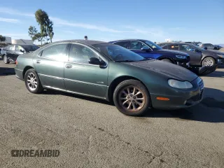 2001 Chrysler LHS z VIN 2C3AC56G31H606648, wystawiony jako Copart lot #77123814 z przebiegiem 83 574 mil mil oraz Tytuł czysty. Historia ofert i sprzedaży dostępna na DreamBid. Obrazek 4.