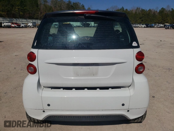 2014 Smart fortwo Pure с VIN WMEEJ3BA0EK780282, выставлен на аукционе Copart как лот 47691815 с пробегом 74 144 миль миль и Чистый • Clean title. История ставок и продаж доступна на DreamBid. Изображение 6.