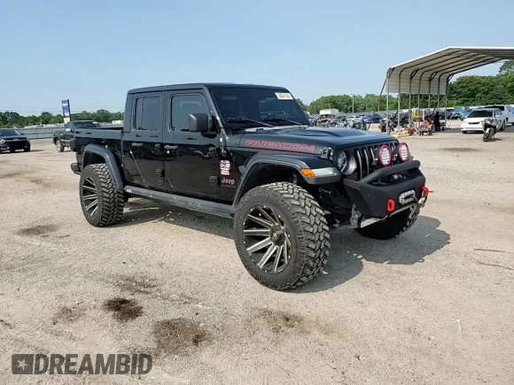 2020 Jeep Gladiator Rubicon with VIN 1C6JJTBG2LL166964, listed as a Copart auction lot 58041945 with 62,716 mi miles and Salvage title. Bid and sale history available at DreamBid. Image 13.
