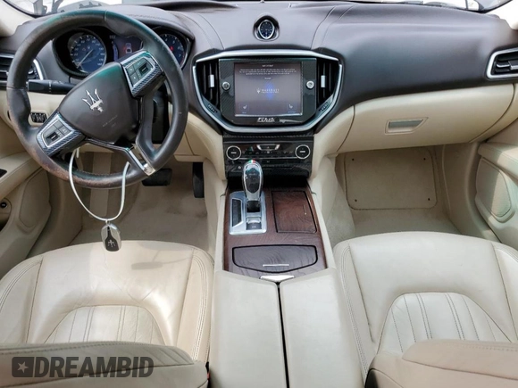 2014 Maserati Ghibli S Q4 with VIN ZAM57RTA6E1085708, listed as a Copart auction lot 53710095 with 110,799 mi miles and Salvage title. Bid and sale history available at DreamBid. Image 8.