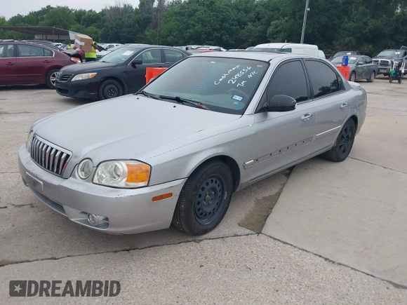 2003 Kia Optima LX z VIN KNAGD128235248556, wystawiony jako IAAI lot #42366002 z przebiegiem 140 904 mil mil oraz . Historia ofert i sprzedaży dostępna na DreamBid. Obrazek 2.