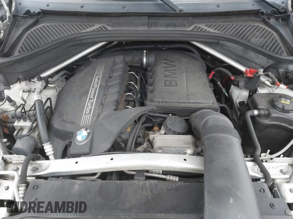 2015 BMW X6 xDrive35i with VIN 5UXKU2C57F0N77194, listed as a IAAI auction lot 41818860 with 105,579 mi miles and . Bid and sale history available at DreamBid. Image 10.