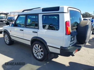 2004 Land Rover Discovery SE with VIN SALTY19424A833762, listed as a IAAI auction lot 41358827 with 144,416 mi miles. Bid and sale history available at carsss.com. Image 3.