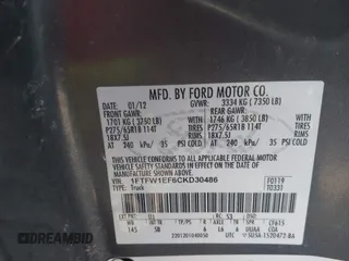 2012 Ford F-150 XL with VIN 1FTFW1EF6CKD30486, listed as a IAAI auction lot 41972362 with 328,321 mi miles. Bid and sale history available at carsss.com. Image 9.