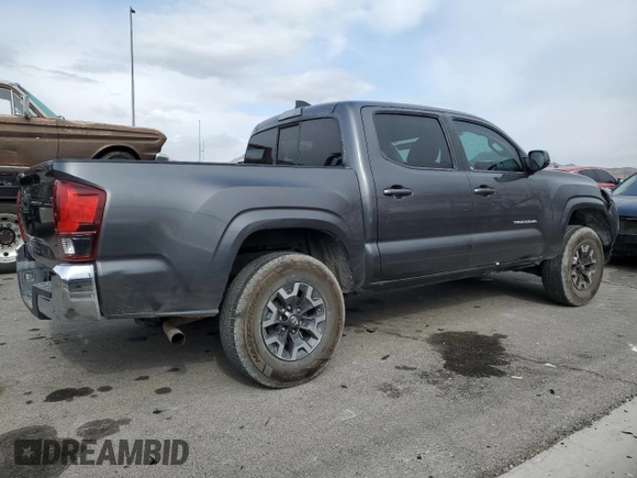 2021 Toyota Tacoma SR with VIN 3TYAX5GN7MT021255, listed as a Copart auction lot 42616935 with 64,626 mi miles and Salvage title. Bid and sale history available at DreamBid. Image 3.