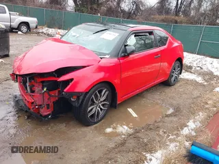 2015 Scion tC z VIN JTKJF5C79FJ013303, wystawiony jako IAAI lot #41581714 z przebiegiem Nie podano mil oraz . Historia ofert i sprzedaży dostępna na DreamBid. Obrazek 20.
