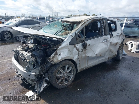2014 Toyota Yaris L with VIN JTDKTUD33ED582669, listed as a IAAI auction lot 41573696 with Not Provided miles and . Bid and sale history available at DreamBid. Image 17.