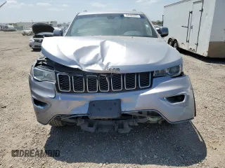 2017 Jeep Grand Cherokee Laredo with VIN 1C4RJEAG0HC816410, listed as a Copart auction lot 52909905 with 102,326 mi miles and Salvage title. Bid and sale history available at DreamBid. Image 5.