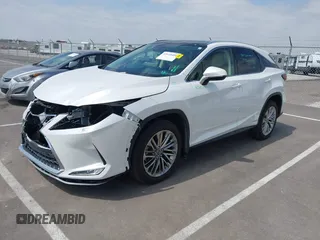 2022 Lexus RX 450h с VIN 2T2JGMDA1NC076975, выставлен на аукционе IAAI как лот 42030488 с пробегом 31 665 миль миль и . История ставок и продаж доступна на DreamBid. Изображение 21.