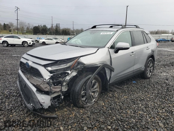 2024 Toyota RAV4 Hybrid XLE Premium with VIN 2T3B6RFV6RW066043, listed as a Copart auction lot 43470115 with 9,454 mi miles and Salvage Title. Bid and sale history available at DreamBid. Image 1.