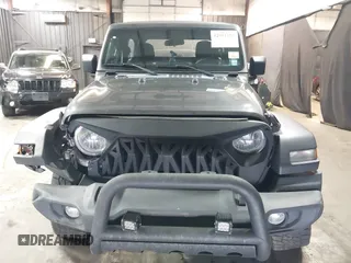 2021 Jeep Wrangler Sport S with VIN 1C4HJXAG2MW502452, listed as a IAAI auction lot 42031159 with 87,952 mi miles and . Bid and sale history available at DreamBid. Image 12.