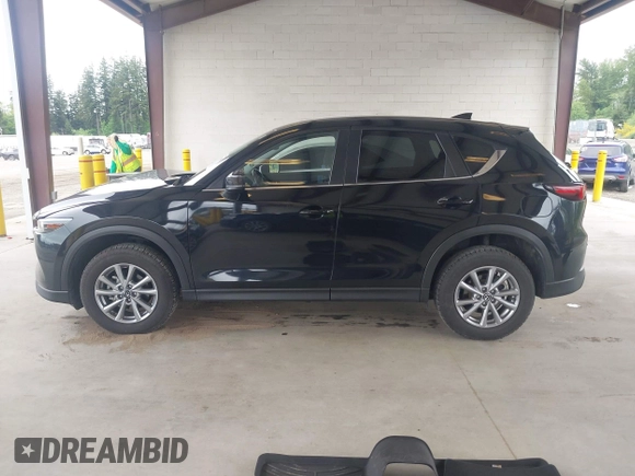 2023 Mazda CX-5 S Carbon Edition z VIN JM3KFBCM8P0140333, wystawiony jako IAAI lot #42292848 z przebiegiem 49 587 mil mil oraz . Historia ofert i sprzedaży dostępna na DreamBid. Obrazek 15.