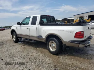 2001 Ford F-150 XL with VIN 1FTRX08L51KE49004, listed as a Copart auction lot 60470745 with 199,490 mi miles and Salvage title. Bid and sale history available at DreamBid. Image 2.