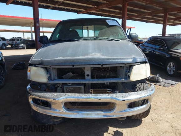 2000 Ford F-150 XL z VIN 1FTRX18L1YNA05567, wystawiony jako IAAI lot #42054536 z przebiegiem 245 018 mil mil oraz . Historia ofert i sprzedaży dostępna na DreamBid. Obrazek 12.