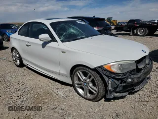 2012 BMW 1 Series 135i with VIN WBAUC9C52CVM12915, listed as a Copart auction lot 67145834 with 114,306 mi miles and Salvage title. Bid and sale history available at DreamBid. Image 4.