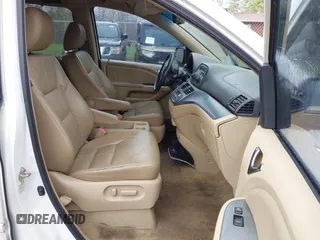 2010 Honda Odyssey EX-L with VIN 5FNRL3H65AB068497, listed as a IAAI auction lot 42013925 with 206,668 mi miles. Bid and sale history available at carsss.com. Image 5.