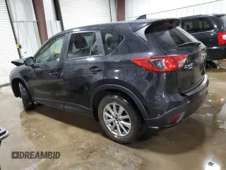 2016 Mazda CX-5 Touring with VIN JM3KE4CY0G0899611, listed as a Copart auction lot 52872915 with 76,801 mi miles and Salvage Title. Bid and sale history available at carsss.com. Image 2.