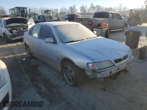 2002 Infiniti G20 Luxury with VIN JNKCP11A02T512055, listed as a Copart auction lot 42599045 with 160,649 mi miles and Salvage Title. Bid and sale history available at DreamBid. Image 4.